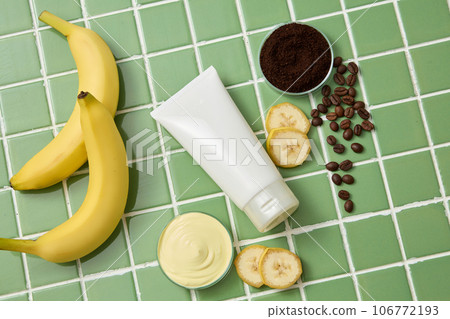 Glass petri dishes of coffee powder and cream texture. Unlabeled white tube. Banana (Musaceae) contains nutrients that are beneficial for your hair Glass petri dishes of coffee powder and cream texture. Unlabeled white tube. Banana (Musaceae) contains nutrients that are beneficial for your hair 106772193
