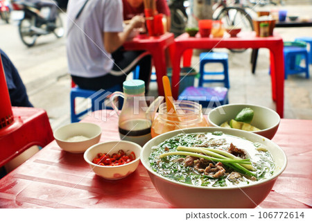 Pho on a street corner in Hanoi, Vietnam 106772614