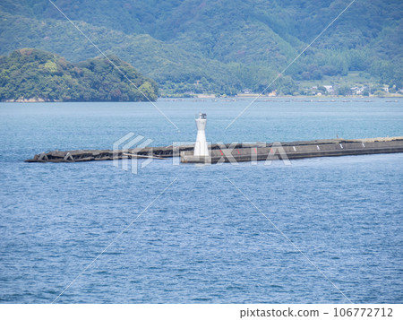 Scenery of the Obama Port offshore breakwater lighthouse and Obama Bay (a branch of Wakasa Bay). (Obama City, Fukui Prefecture) 106772712