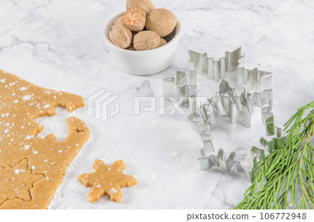 Raw dough for christmas cookies 106772948