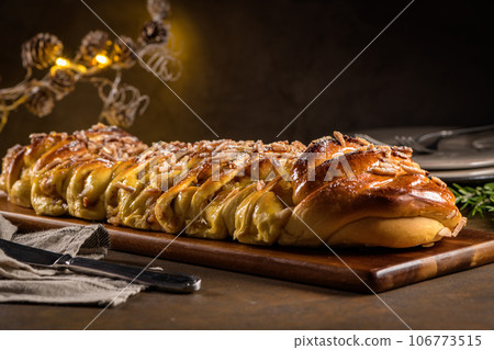Christmas braided cinnamon cake Christmas braided cinnamon cake 106773515