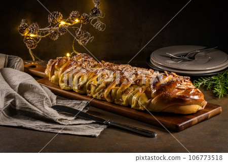 Christmas braided cinnamon cake Christmas braided cinnamon cake 106773518
