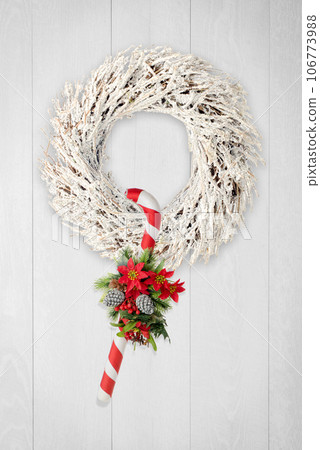 Christmas wreath and cane 106773988