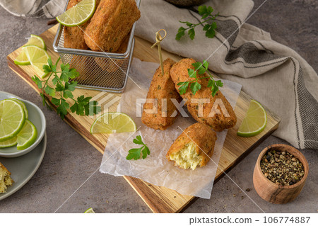 Cod dumplings or bolinhos de bacalhau 106774887