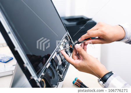 repairing the broken computer 106776271
