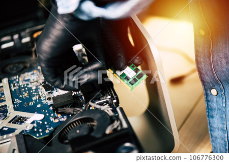 repairing the broken computer 106776300