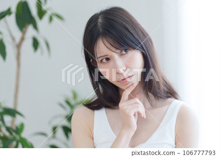 Thinking woman 106777793