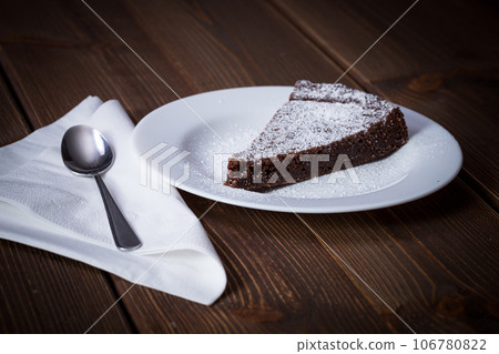 Chocolate Cake Slice on white dish 106780822