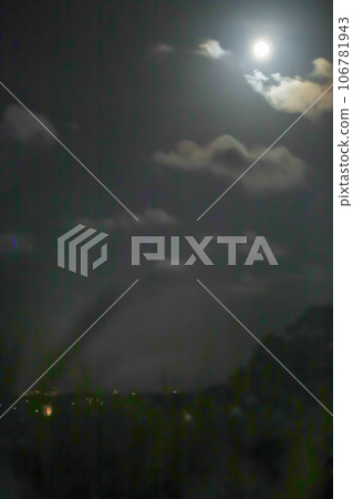 Supermoon lights up the summer night sky 106781943