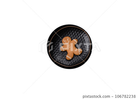 Beautiful different Christmas decorations and gingerbread on a brown concrete table 106782238