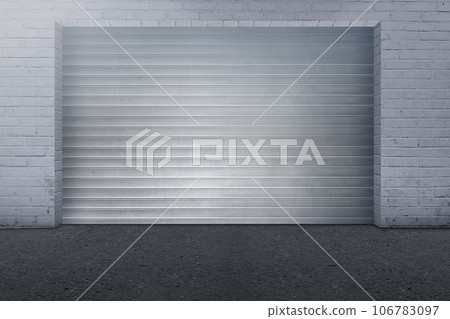 Brick wall with steel shutter door Brick wall with steel shutter door 106783097