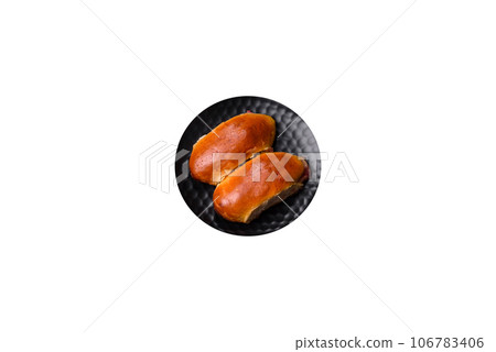 Sweet tasty fresh festive baking on a dark concrete background Sweet tasty fresh festive baking on a dark concrete background 106783406