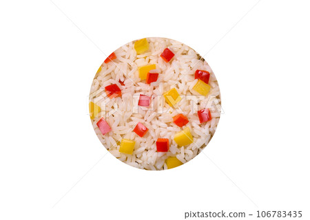 Tasty Asian dish of rice, pepper, spices and herbs Tasty Asian dish of rice, pepper, spices and herbs 106783435