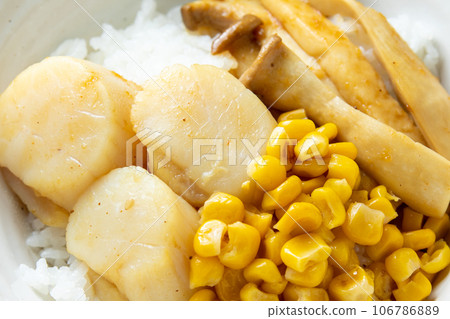 A close-up of the scallop rice bowl (with corn and oyster mushrooms). 106786889