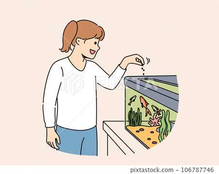 Little girl feeds fish in aquarium and watches underwater pets swimming with pleasure 106787746