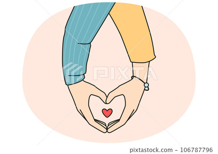 Couple holding hands showing heart symbol Couple holding hands showing heart symbol 106787796