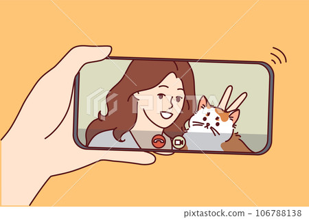 Woman with cat in phone screen during video call, for concept of internet communications 106788138