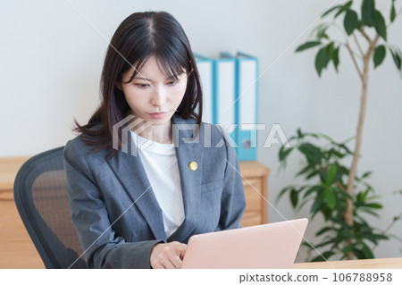 Female lawyer with a lawyer badge 106788958