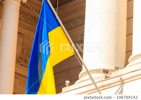 Waving blue and yellow flag of Ukraine 106789142