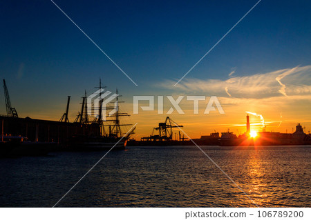 View of Lanterna (lighthouse) in the old port of the city of Genoa at sunset, Italy View of Lanterna (lighthouse) in the old port of the city of Genoa at sunset, Italy 106789200