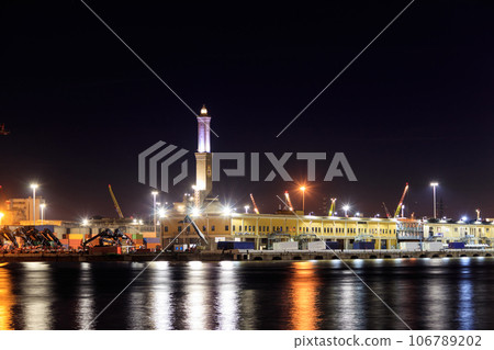 View of Lanterna (lighthouse) in the old port of the city of Genoa at night, Italy View of Lanterna (lighthouse) in the old port of the city of Genoa at night, Italy 106789202