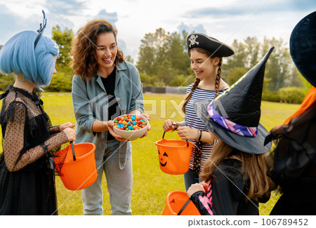people celebrating Halloween 106789452
