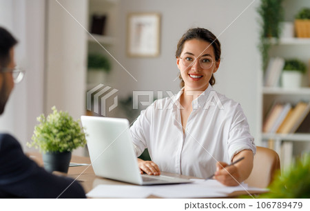 Man and woman are working in office 106789479