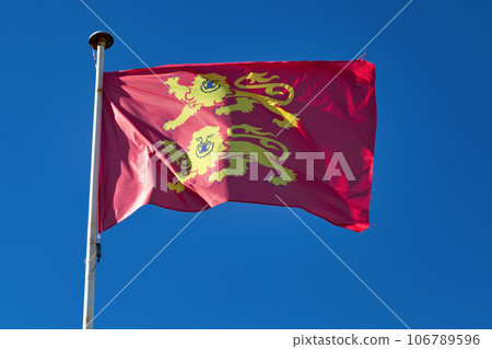 Norman flag waving in mid air Norman flag waving in mid air 106789596