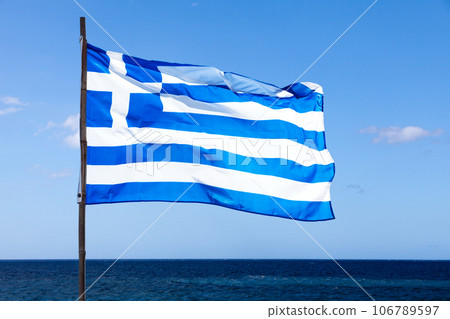 Greek flag waving in mid air 106789597