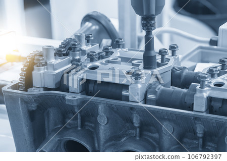 The high technology engine parts assembly process by power spanner. The high technology engine parts assembly process by power spanner. 106792397