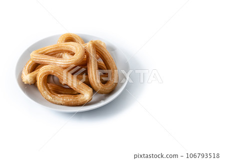 Traditional Spanish churros isolated on white background. Copy space 106793518