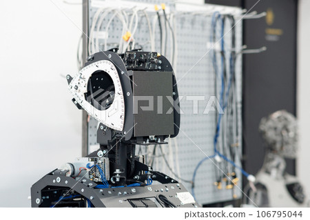 humanoid robot in the process of assembly and adjustment in the workshop humanoid robot in the process of assembly and adjustment in the workshop 106795044