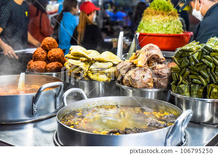 Many vietnamese snacks with boild and fried meat and soup in vietnamese night market in Da Lat Many vietnamese snacks with boild and fried meat and soup in vietnamese night market in Da Lat 106795250