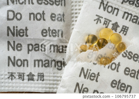 closeup of silica gel packages with cautions closeup of silica gel packages with cautions 106795737