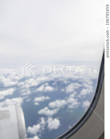 sky and clouds view from airplane window 106795859