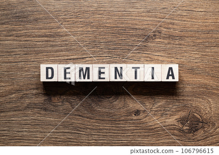 Dementia - word concept on building blocks, text 106796615