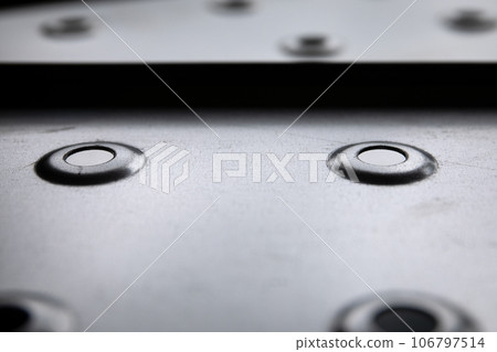 Industrial constructions. Galvanized metal plate surface with holes 106797514
