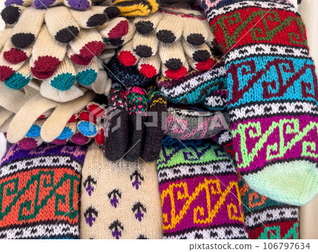 knitted woolen socks and gloves knitted woolen socks and gloves 106797634