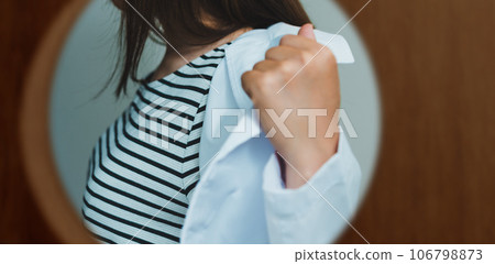 A lady in white 106798873