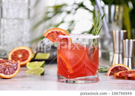 Red Sicilian Orange Paloma Cocktail. 106798949