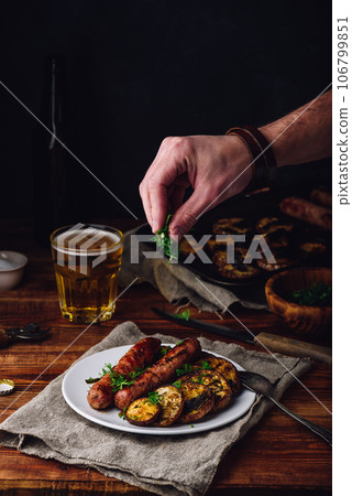 Pork Sausages with Eggplant and Herbs 106799851