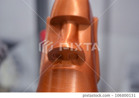 Art object printed on 3D printer. Model printed on 3D printer from melted plastic. Object printed close-up. Concept new modern innovation printing technology Art object printed on 3D printer. Model printed on 3D printer from melted plastic. Object printed close-up. Concept new modern innovation printing technology 106800131