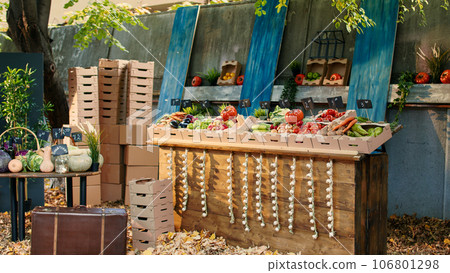 Local bio products on display at farmers market stand with fresh organic agricultural produce. Various colorful eco seasonal fruits and vegetables on table at fair or harvest festival. Local bio products on display at farmers market stand with fresh organic agricultural produce. Various colorful eco seasonal fruits and vegetables on table at fair or harvest festival. 106801298