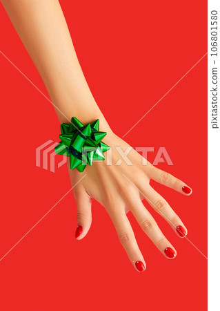 Womans hand with red minimalist nail design. Manicure, pedicure beauty salon concept Womans hand with red minimalist nail design. Manicure, pedicure beauty salon concept 106801580