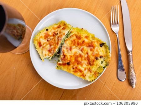 Spinach lasagna is national dish of Italian cuisine 106805980