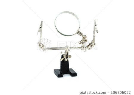 Helping hand magnifier isolated on white background 106806032