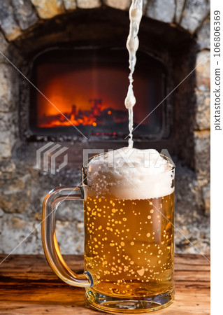 Glass Of Beer And Fireplace Glass Of Beer And Fireplace 106806369