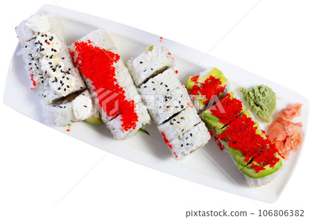 Set of japanese tobiko roll with salmon, avocado, pepino, tobiko Set of japanese tobiko roll with salmon, avocado, pepino, tobiko 106806382