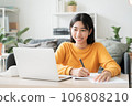 Homeschooling. Asian girl online learn video conference via internet with tutor on computer 106808210