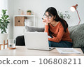 Asian girl online learn video conference via internet with tutor on computer 106808211